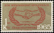 20. výročí založení OSN - symbol spojených rukou